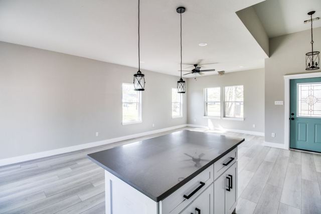 Kitchen with a dark gray island countertop